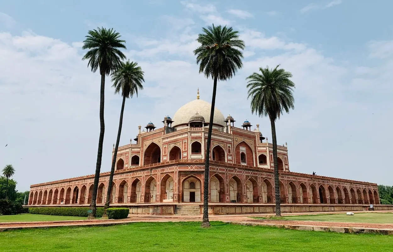 Symmetrical view of Humayuns Tomb with white dome and manicured Mughal gardens