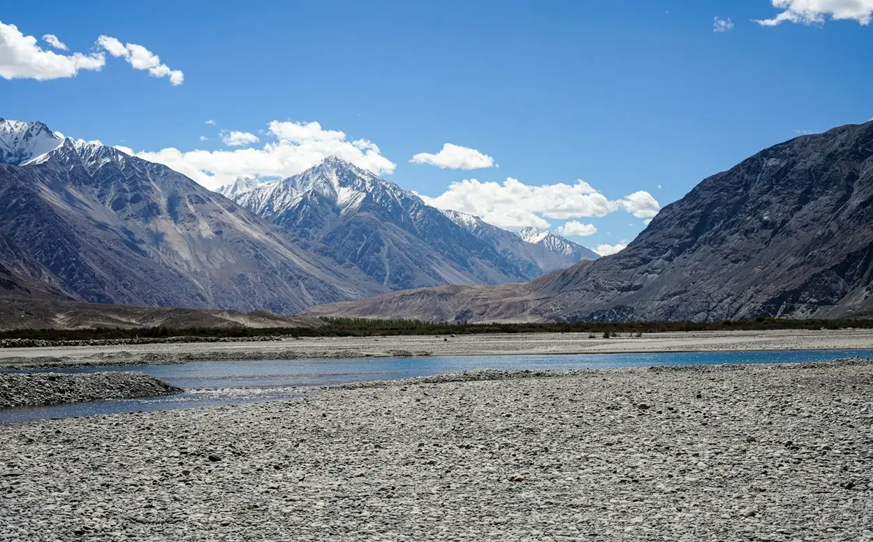 Ladakh mountain pass road in summer, showing the high-altitude landscape accessible during warmer months