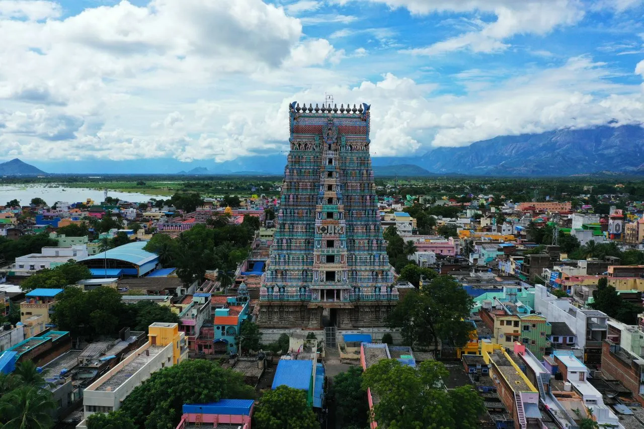 Vibrant sculpted tower gopuram of the ancient Meenakshi Temple in Madurai Tamil Nadu
