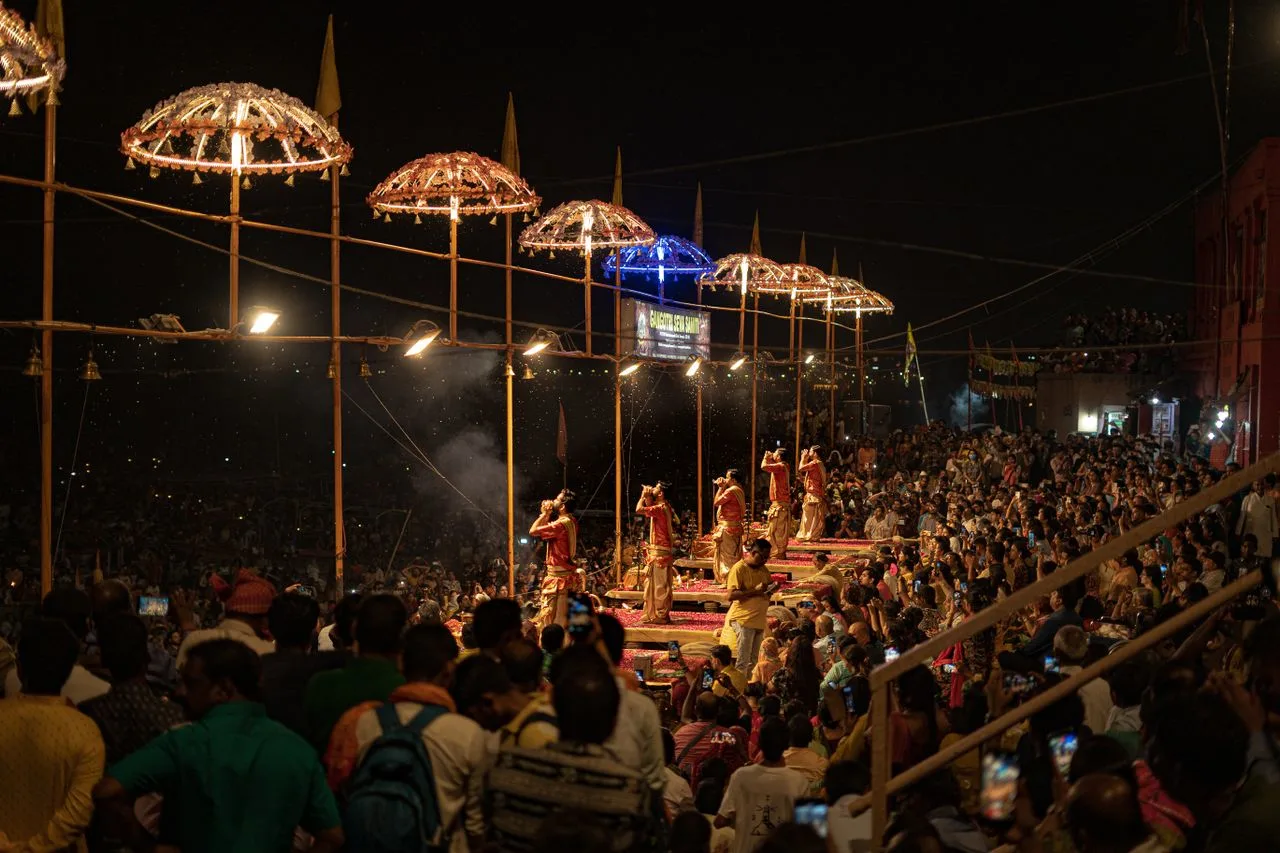 Priests performing the grand Ganga Aarti ritual on the steps of Dashashwamedh Ghat in Varanasi