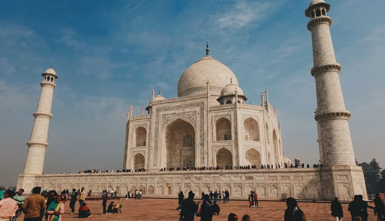 Agra Trip Cost Complete Budget Breakdown showing tourists visiting the Taj Mahal