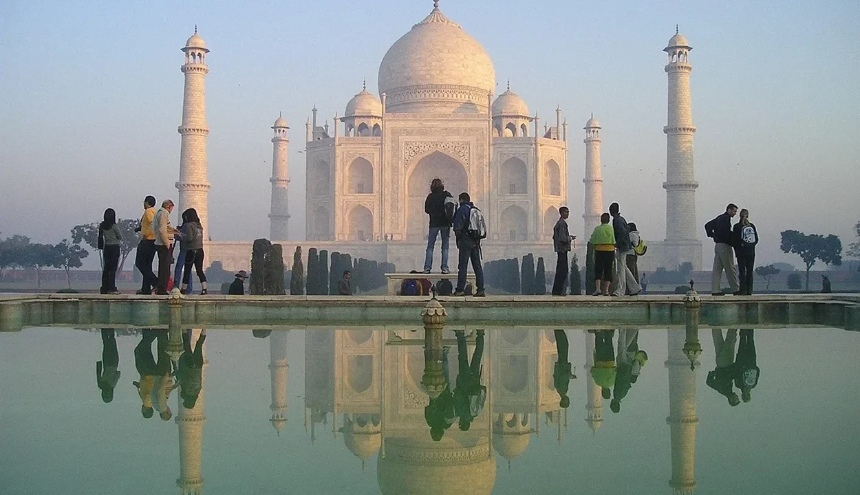 Taj Mahal reflection in the pool during morning hours for Agra accommodation guide
