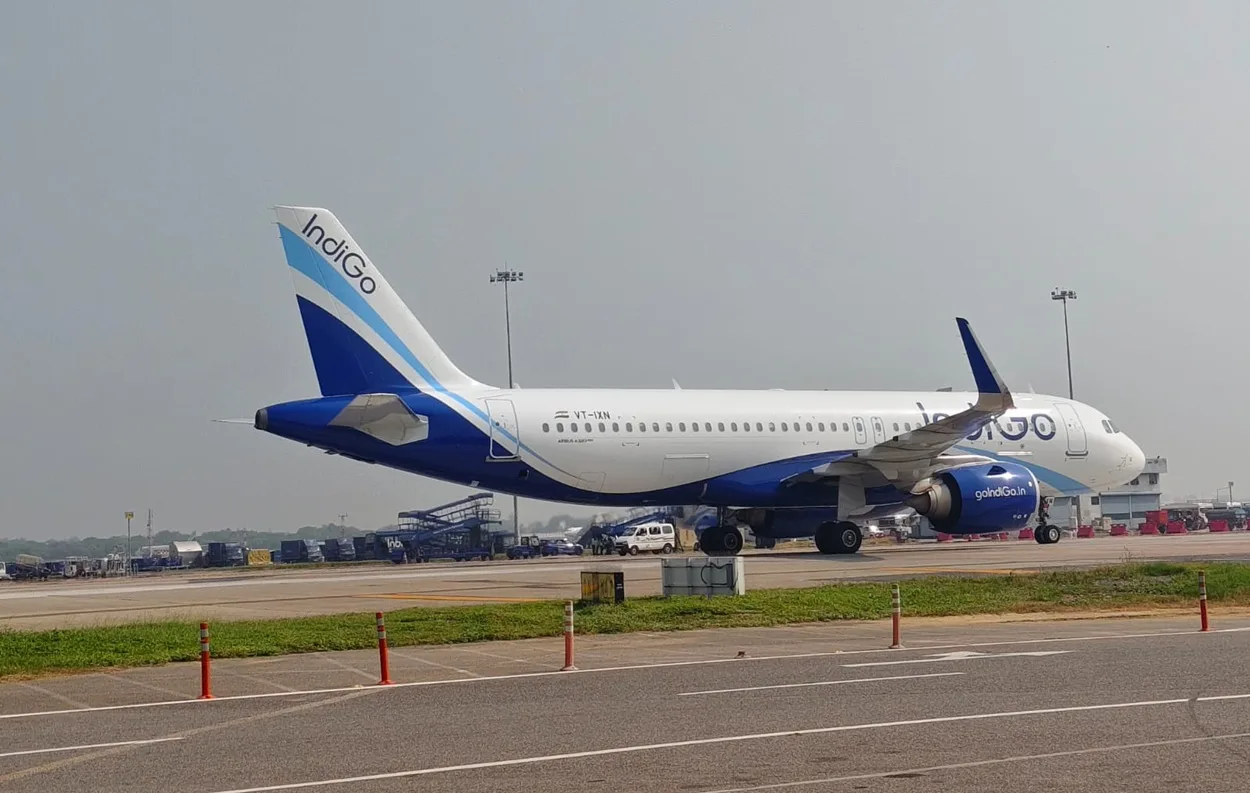Boarding a domestic flight at Delhi Airport connecting to Dehradun in our how to reach Rishikesh guide